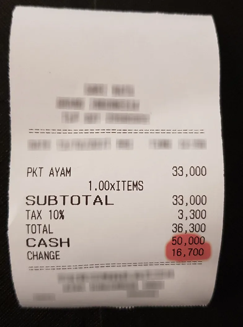 The edited receipt with Sightova's forgery heatmap. The heat sits on the rewritten CHANGE amount and its immediate surroundings: 0.9% of the image.